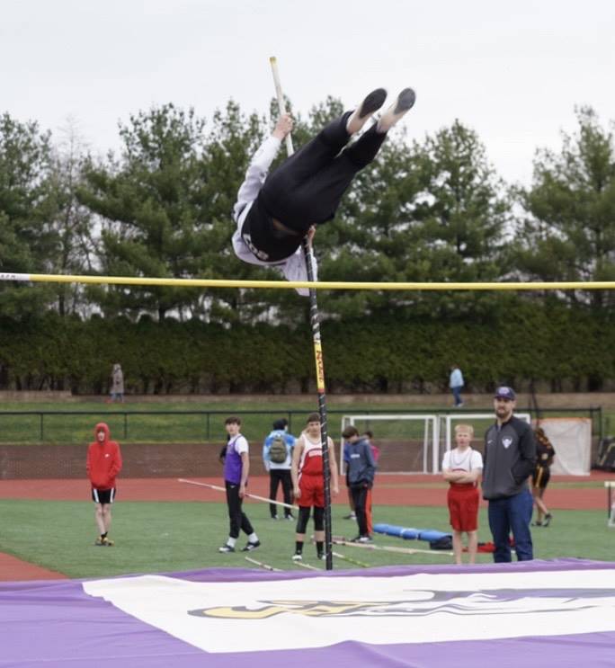 pole vaulter clearing the bar