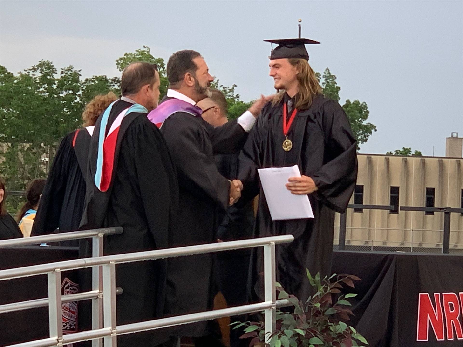 Salutatorian receiving recognition at graduation